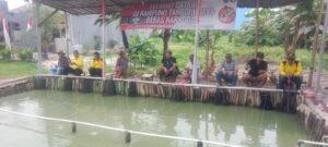 Kapolres Metro Tangerang Kota Berikan Ikan Nila untuk Masyarakat Kampung Tangguh Bebas Narkoba RW 09 Sudimara Barat Ciledug