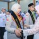 Bupati Maya Hasmita Sambut Kepulangan Jamaah Haji Kloter KNO-013 di Labuhanbatu.