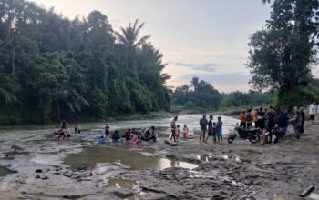 Seorang Pemuda Dilaporkan Tenggelam di Sungai Pertapahan Desa Tadukan Raga Deli Serdang